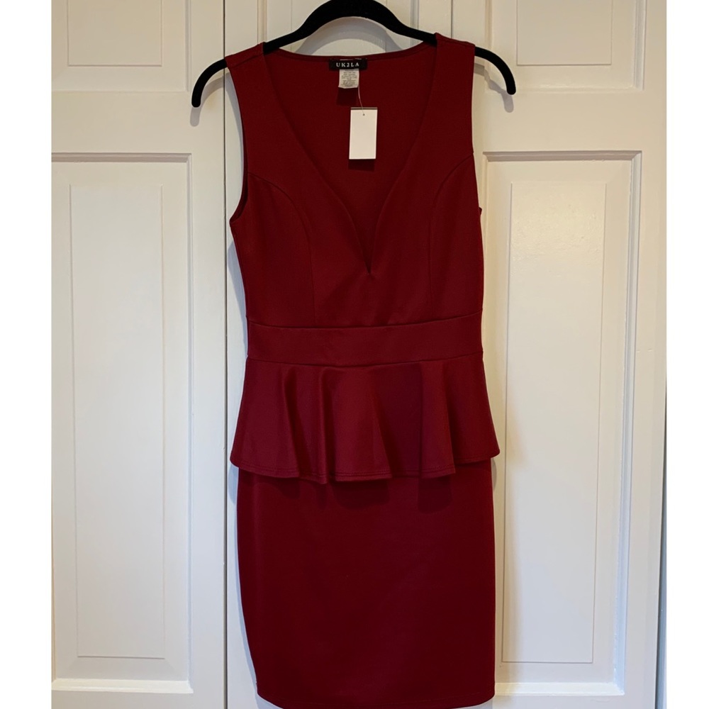 Deep red plunging v-neckline peplum dress